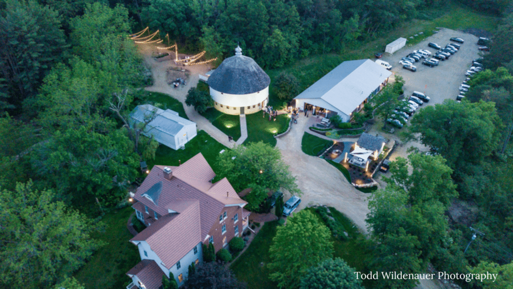 Aerial view of the Round Barn Farm wedding venue located in Red Wing, Minnesota. Best historic barn wedding venue in Southeastern Minnesota with a Bed and Breakfast on-site.