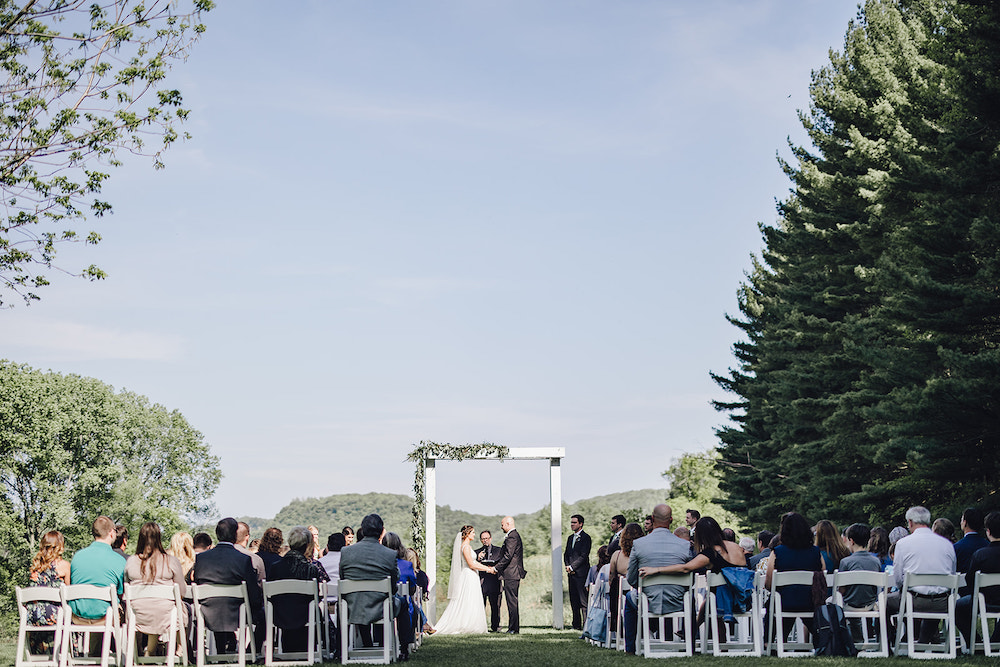 Beautiful wedding on the grounds at Round Barn Farm, one of the best outdoor wedding venues in Minnesota