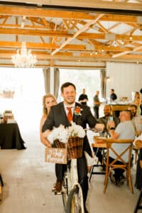 Grand March on a bike at the Best Minnesota wedding venue in Red Wing, MN