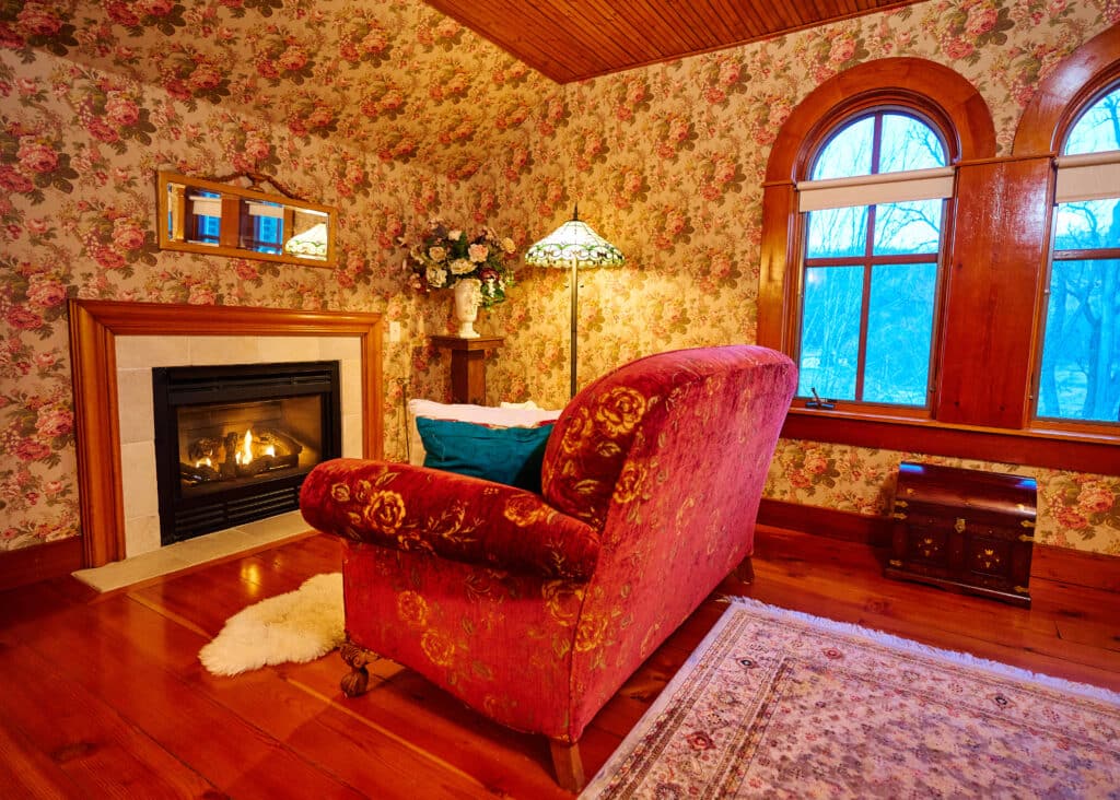Cuddle up in front of the fire in the Hearts and Flowers Suite at our Bed and Breakfast in Red Wing MN.